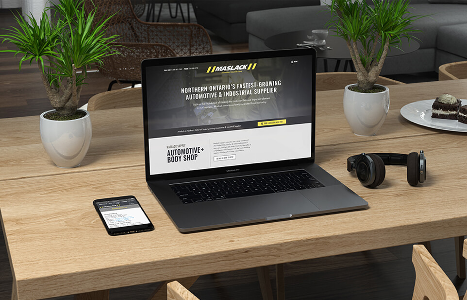 maslack website open on a laptop and cell phone